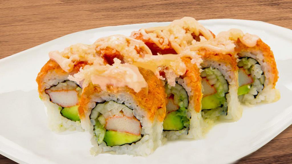 Volcano Roll · Spicy tuna on top of California roll with spicy mayo, scallion and crunchy flakes on top. 440 Cal.