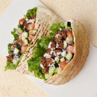 Beef Pita Sandwich · Wrapped in a pita with lettuce, cucumber, tomato, and your choice of sauce.