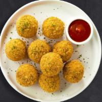 Fry My Mac & Only · Freshly fried mac and cheese balls served with classic cheese sauce for dipping.