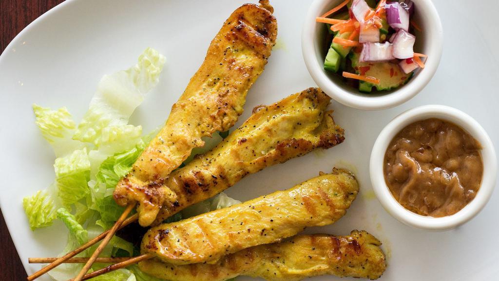 3. Satay Chicken · Marinated grilled chicken served with peanut sauce and cucumber salad.