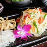 Papaya Salad · Thai style Green papaya, peppers, lime juice, garlic, tomato and crab in spicy sauce served ...