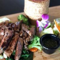39. BBQ Beef · Grilled beef with Thai style spicy lime sauce.