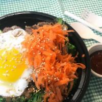 Bibim Bob · sautéed vegetable & choice meat  with a fried egg and  rice &  Korean spicy sauce(gochujang)...