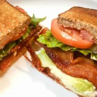 BLTA · bacon,lettuce,tomato,avocado,mayo on toasted wheat bread with potato chips