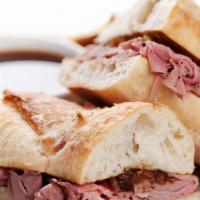 French Dip · sliced roast beef,swiss cheese, aju sauce on french roll with potato chips