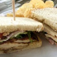 Chicken Club · grilled chicken,swiss cheese,bacon,garlic mayo,tomato,lettuce & red onion on sliced sourdoug...