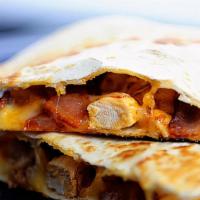Quesadilla · cheddar cheese,jack cheese on flour tortilla with potato chips