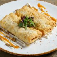 House Made Sausage Rolls · House made sausage with herbs and spices rolled in puff pastry and baked to perfection, whol...