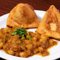 Vegetable Samosa (2 Pieces) with Garbanzo · Most popular. Crisp turnover stuffed with potatoes, peas, herbs, and spices.