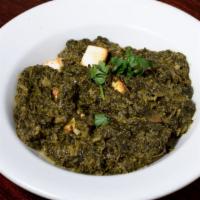 Palak Paneer · Most popular. Spinach with homemade cheese, herbs and spices.