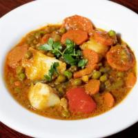 Mixed Vegetable Masala · Cauliflower, potatoes, green beans, peas and carrot in curry sauce.
