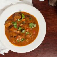Lamb Curry · Lamb with ginger, garlic and a special blend of spices.
