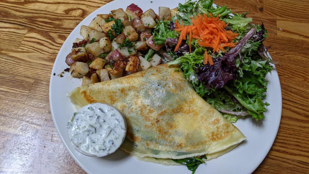 Greek (Savory Crepe) · Spinach, kalamata olives, roasted almonds, and onions with feta cheese and cucumber yogurt sauce.