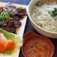 23A. Grill BBQ Pork Noodle Soup · Flame grilled BBQ pork on the side w/ homemade fish sauce served w/ your choice of broth (ch...