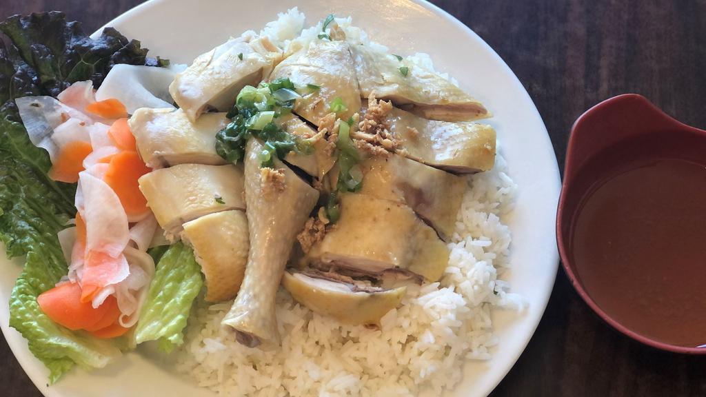 22. Steamed Chicken over Rice · Vietnamese style chicken (bone-in) over rice served w/ homemade ginger sauce on the side