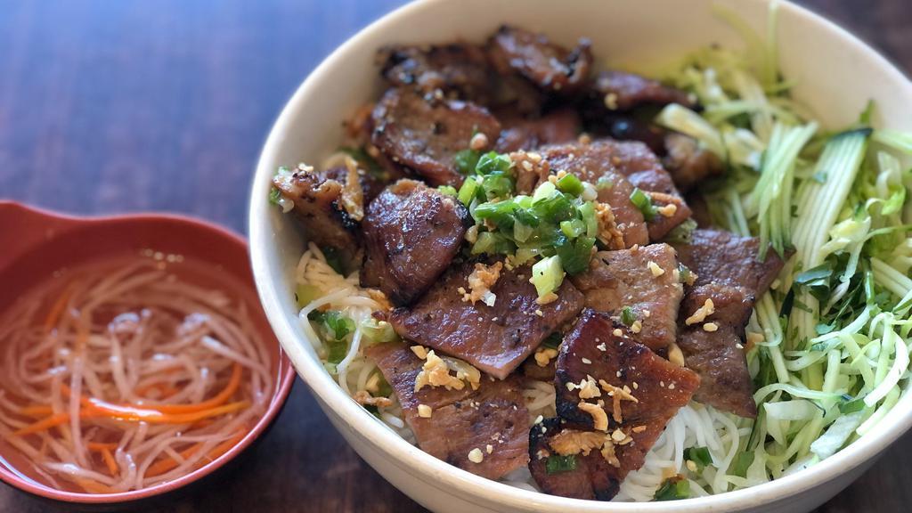 31. BBQ Pork with Vermicelli  · *Contains Peanuts.* Flame grilled BBQ pork topped w/ peanuts, scallion, lettuce & shredded cucumber served w/ homemade fish sauce on the side