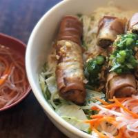 30. Fried Egg Roll with Vermicelli · *Contains Peanuts.* Deep fried egg roll topped w/ peanuts, scallion, lettuce & shredded cucu...