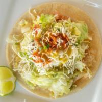 Super Taco · Your Choice of Meat, Lettuce, Pico De Gallo, Guacamole, Cheese, and Sour Cream on a Large So...