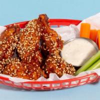 Fried Korean Chicken Wings · (6) Tossed with sesame seeds, scallions, and cilantro and served with a lemon blue cheese di...