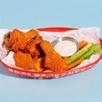 Fried Thai Chicken Wings · (6) Tossed with thai curry paste, lemongrass, brown sugar, soy sauce, and coconut milk.