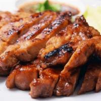 BBQ pork  · Grilled pork marinated with Thai herbs, served with house salad and sweet & sour sauce (Lunc...