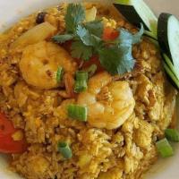 Pineapple Fried Rice · Shrimp, chicken, egg, tomato, onion, pineapple, raisin, cashew nut, curry powder