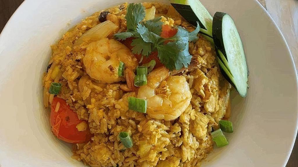Pineapple Fried Rice · Shrimp, chicken, egg, tomato, onion, pineapple, raisin, cashew nut, curry powder