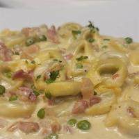 'Giorgio' (Meat Tortellini) · Meat tortellini with sweet peas and pancetta in a rich creamy sauce