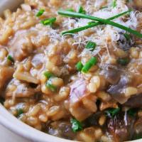 Risotto Porcini · Risotto with imported dried Porcini mushrooms sauce