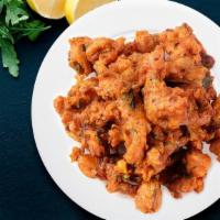 Traditional Onion Pakora · Also called as onion pakora is a deep-fried snack made with chickpea flour, salt, light spic...