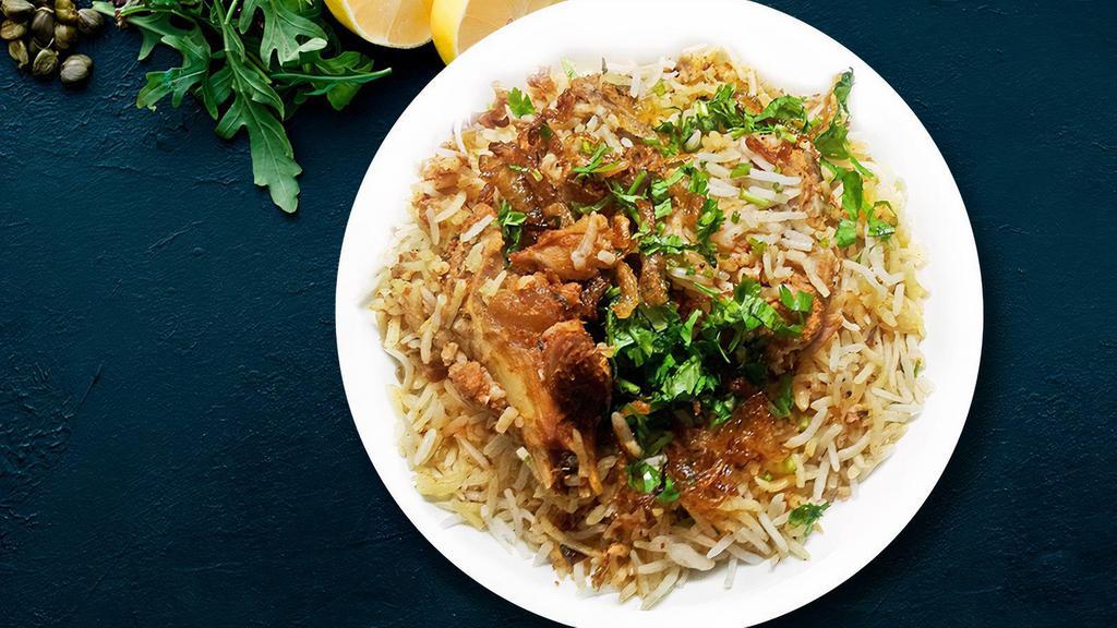 FB's Goat Biryani · Long grain basmati rice flavored with saffron and cooked with a delicate blend of  exotic spices, herbs, and tangy minced lamb. Served with raita and salan.