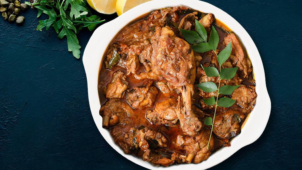Traditional Kodi (Chicken) Curry · Boneless chicken marinated with salt, ginger garlic paste, and lemon juice is then cooked with brown onion paste, tomatoes, cashew paste.