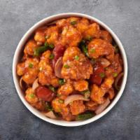 Go Go Gobi Manchurian · Cauliflower pieces dipped in corn batter and fried with soy sauce, tomatoes, chilies and gar...