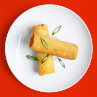 Fried Chicken Egg Rolls · Four crispy fried egg rolls filled with chicken.