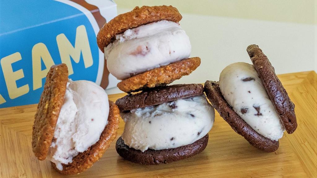 Vegan Sandwich 4 Pack · (2) Fudging Awesome Cookie and Soy Mint Chip Ice Cream (2) Maple Oatmeal Raisin Cookie and Soy Strawberry Ice Cream 2,120 cal. per pack