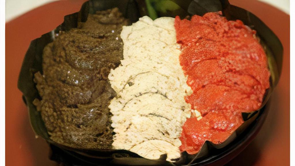 Lemat Kitfo · Special kitfo served with Ethiopian style lemat homemade cottage cheese and collard green kitfo.