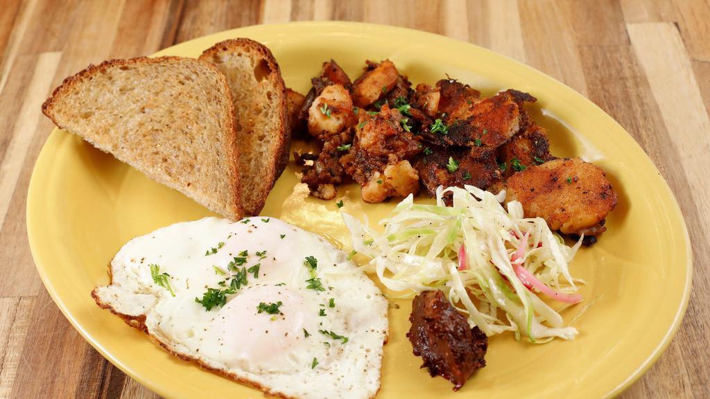Country Breakfast · Two eggs (any style), smashed potatoes, cabbage slaw, white or wheat toast, harissa.