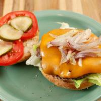 L’acajou Burger · 1/3 lb. ground beef patty, sautéed shallots, tomato, housemade pickles, mayo, and whole grai...