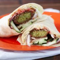 Falafel Sandwich (Vegetarian) · Fresh Falafel served on a wrap with Hummus, lettuce, tomatoes, cucumbers, onions and pickles.