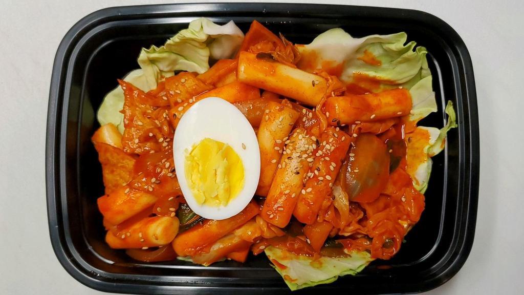 Tteokbokki · Korean stir-fried rice cakes. Comes with 3 side dishes, changing daily.