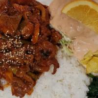 Spicy BBQ Pork (돼지 불고기) · Served with rice and salad. Comes with 3 side dishes, changing daily.