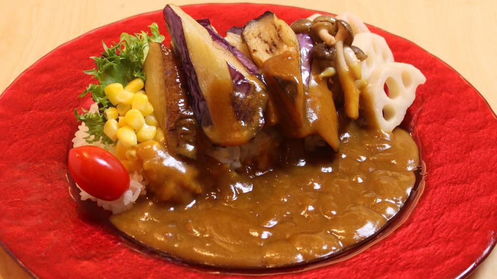 924. Veggie Curry · Eggplants, lotus roots, Shimeji mushrooms, Japanese style curry sauce and rice(VG).