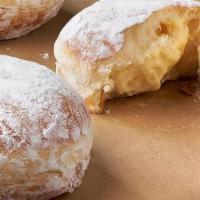 King Cream Donut · Soft Donut, Bavarian Cream, Powdered Sugar.

Contains: Egg, Milk, Soy, Wheat
