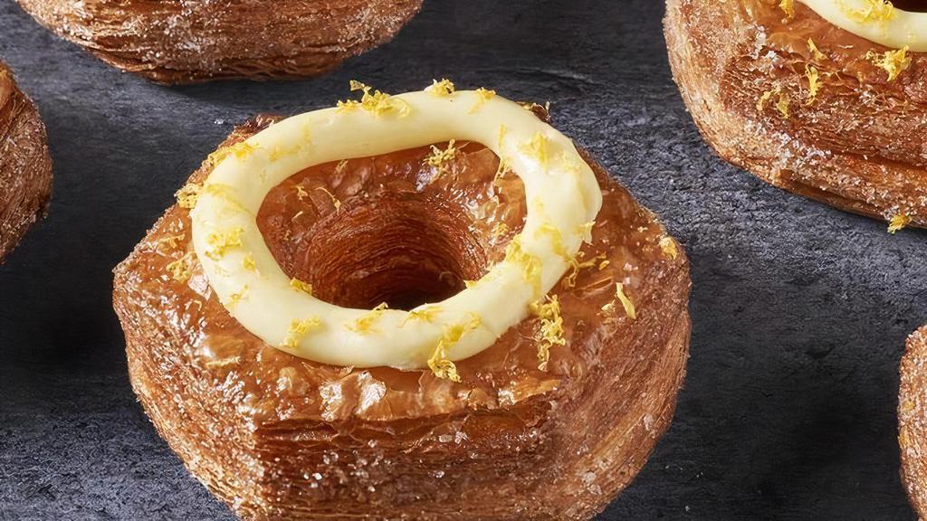 Croissant Donut · Pastry dough, vanilla Bavarian cream, lemon icing.

Contains: Coconut, Egg, Milk, Wheat