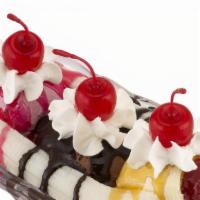 Banana Split · Fresh banana, vanilla ice cream, chocolate ice cream, strawberry ice cream, whip, cherry, ch...