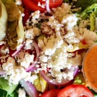 Greek Salad · Mixed greens, tomatoes, cucumber, red onions, Feta cheese & green olives.Served with oregano...