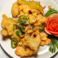 Salt & Pepper Fish · Filet of fish deep fried and tossed in our house special seasoning