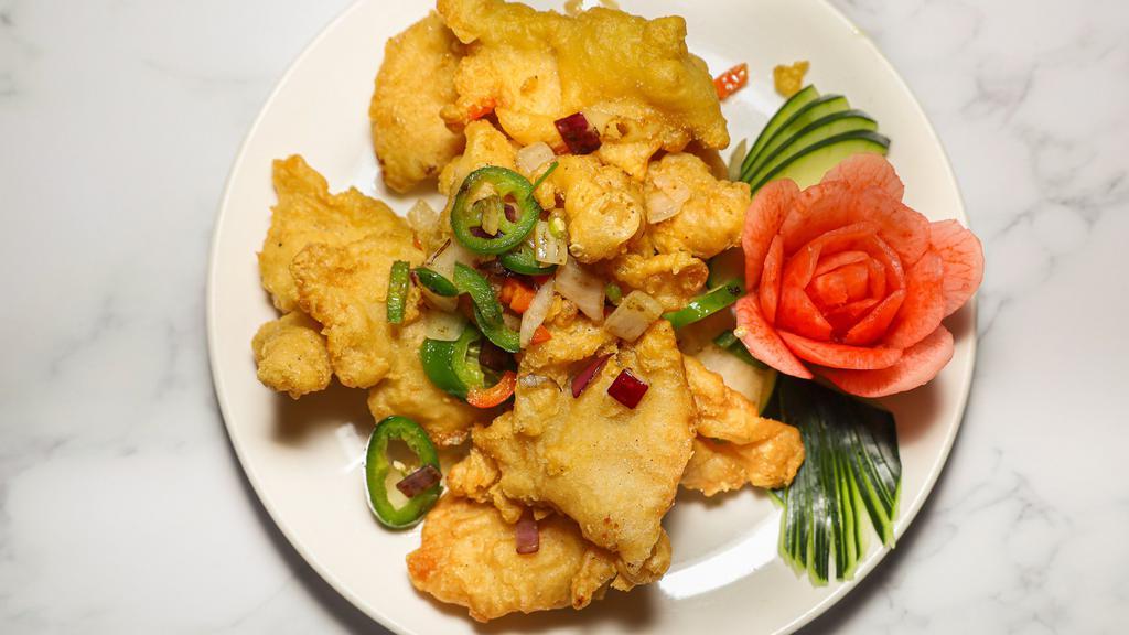 Salt & Pepper Fish · Filet of fish deep fried and tossed in our house special seasoning