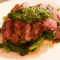 Grilled Niman Ranch Skirt Steak · with potato-leek gratin, sautéed broccoli & horseradish chimichurri.