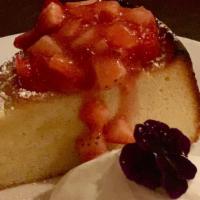 Almond Cake  · with crème anglaise, raspberries & whipped cream